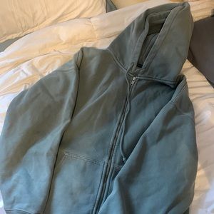 Brandy Melville sage green zip up